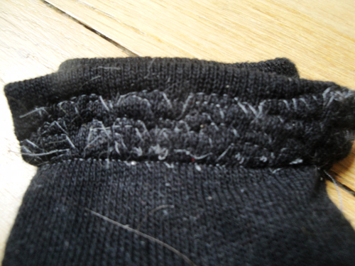 badly sewn stitches on BB-sock mute Nissim Schaul